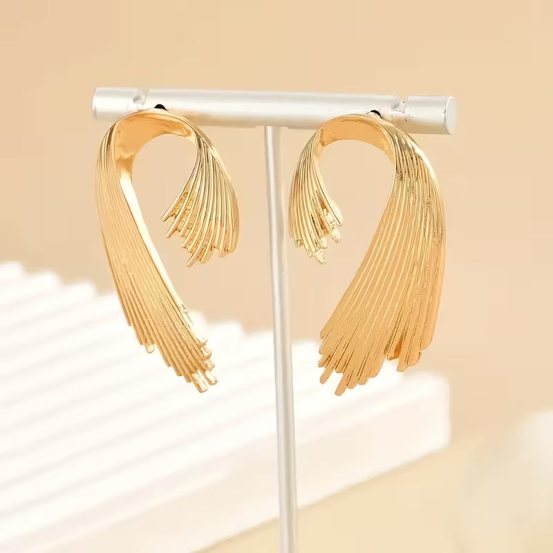 Sway Your Way Golden Dangle Earrings